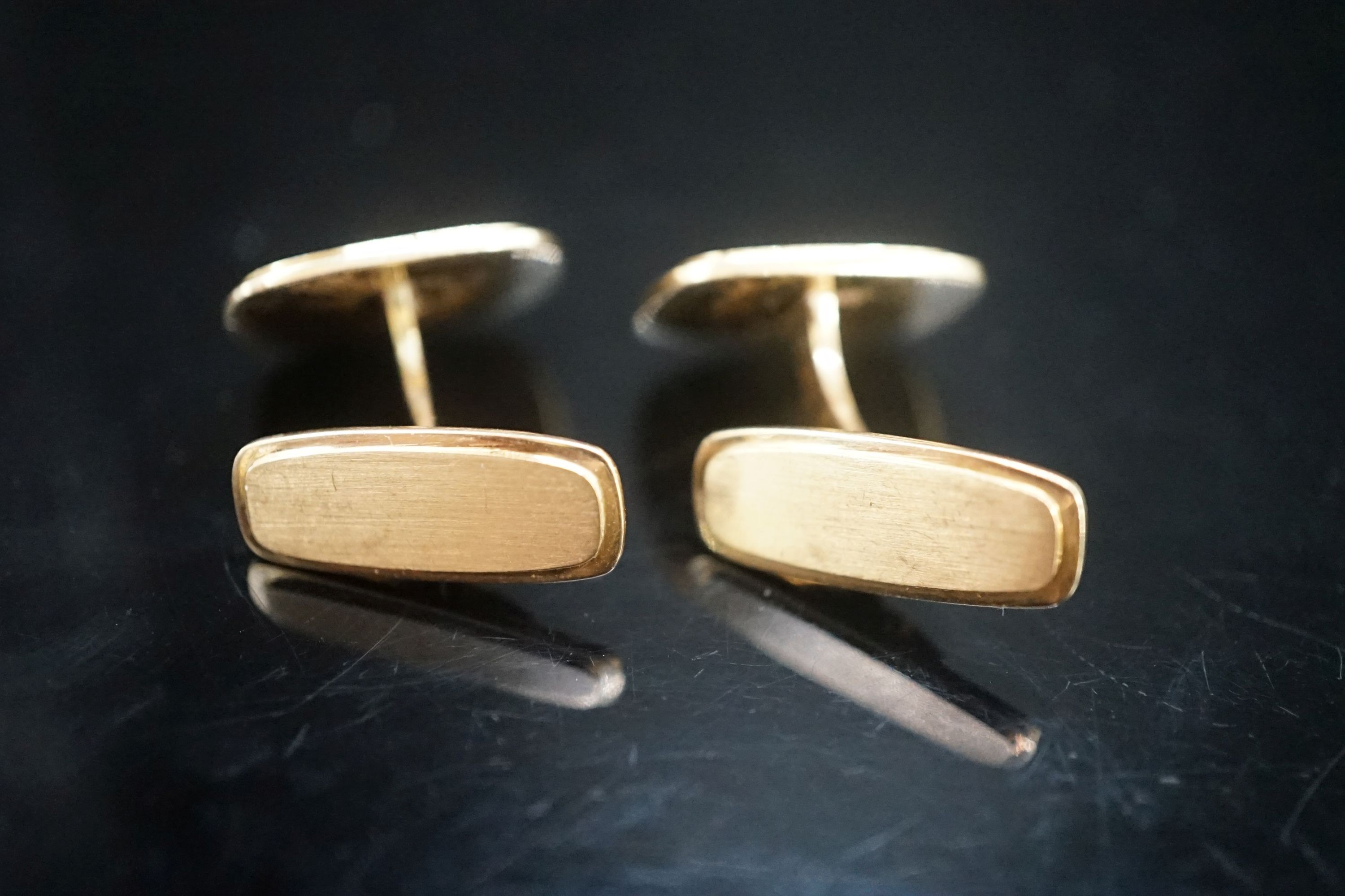 A pair of 585 yellow metal cufflinks, with engraved initials, 18.2 grams.